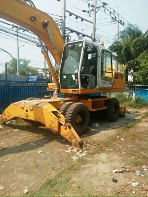 ขายรถตักล้อยาง LieBherr A922 แม็คโค และดันดินในคันเดียว มีเล่มทะเบียนเอกสารพร้อม