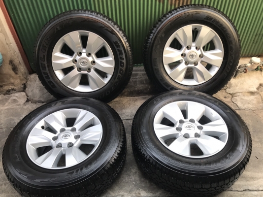 ขายล้อแม็ก Toyota Revo ขอบ17 พร้อมยางป้ายแดง 265-65-17 Bridgestone ปี 16