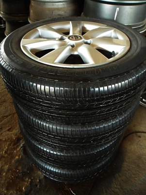 แม็กขอบ15 แท้ 4รู100 ยางบริดสโตน ลงพื้นปี14 ดอกหนา ล้อละ1400