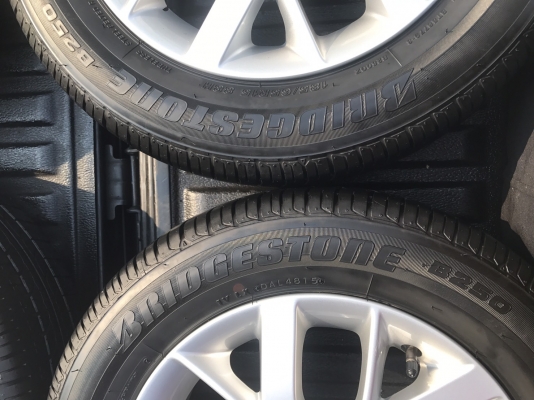 แม็กป้ายแดง Nissan Almera MC ขอบ15 พร้อมยาง 185-65-15