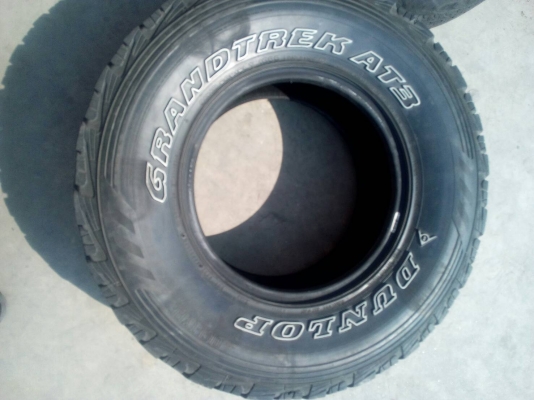 31x10.50R15  DUNLOP GRANDTREK AT3 มี 1 เส้น ไม่มีปะ ใช้ทำอะไหล่ tel.063-286-3551081-427-3941