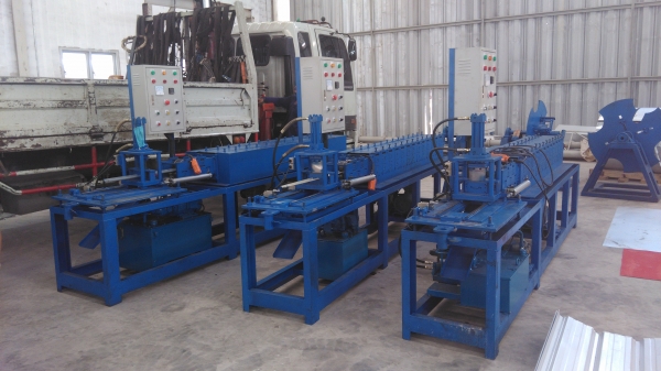 เครื่องรีดใบประตูม้วน เครื่องรีดใบประตูม้วน