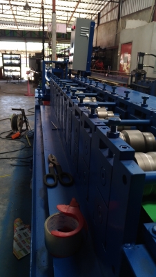 เครื่องรีดใบประตูม้วน เครื่องรีดใบประตูม้วน