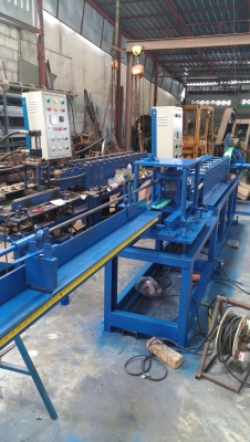 เครื่องรีดใบประตูม้วน