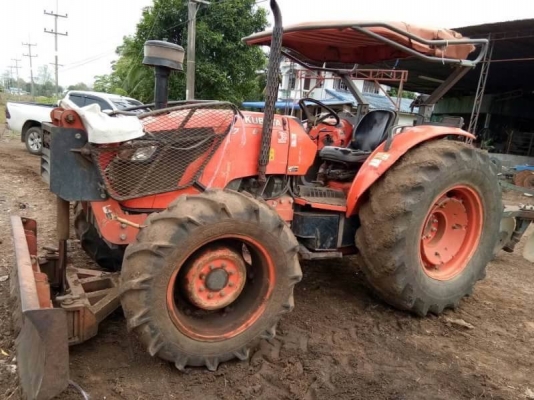 KUBOTA  M 7040 ปี52 ราคา 355,000 บาท  4,530 ชม. เครื่องดี เกียร์แรง  ยางดี. (ใบมีด-หาง 6) เอกสารเล่มทะเบียน  รถอยู่ จ.ศรีษะเกศ 0610710295 ไอดีไลน์ 0610710295