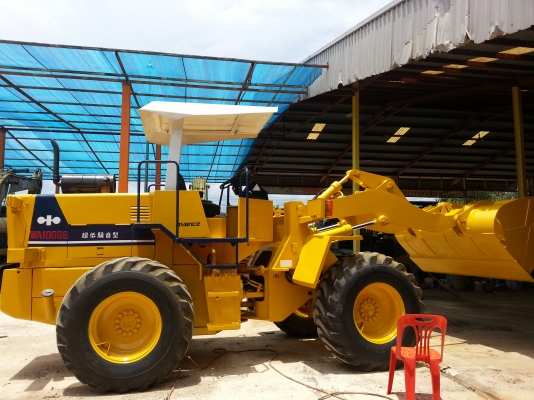 ขายรถตักล้อยาง KOMATSU WA 100-1 รถนำเข้าจากนอกแท้ยังไม่เคยใช้งานในไทยสภาพเต็มทุกอย่างมีเอกสารอินวอยไฟฟ้าครบรถพร้อมใช้ร้านละอองดาวแทรคเตอร์นครชัยศรี