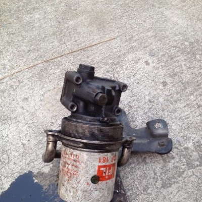 ไอเสียเดิม CAMEO TFR -  ฐานกรองน้ำมันเครื่อง TFR