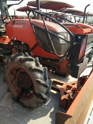 ขายแทรกเตอร์ Kubota M6040 พร้อมใบมีดดันดิน ตามสภาพรถใช้งานได้ดี