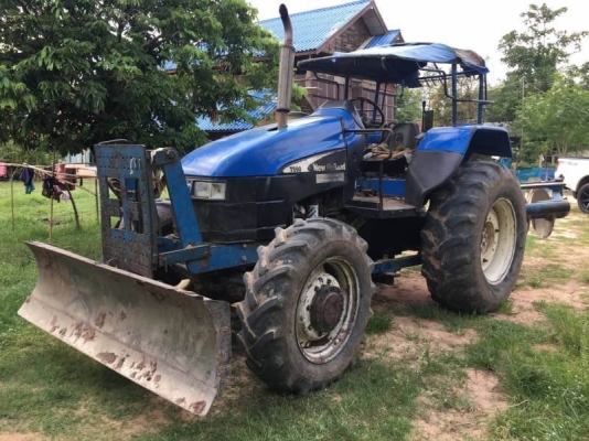 ขาย 695,000 บาท รถไถ 2 เพลา NEWHOLLAND TS 90 ทำงาน 1x,xxx  ชม. (แถม ใบมีดหน้า และ หาง 7 )เครื่องดี เกียร์แรง ยางคู่หลังไม่สวย  เอกสารเล่มทะเบียน  รถอยู่ จ.ร้อยเอ็ด โทร&amp;ไอดีไลน์ 0610710295