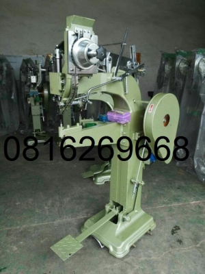 เครื่องย้ำหมุดใบประตูม้วน