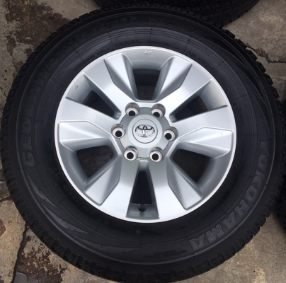 แม็กพร้อมยางป้ายแดง 265-65-17 Toyota Revo ขอบ17