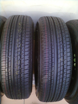ขายยางป้ายแดงพร้อมกะทะเหล็ก 4 รู 175/65R15 บริสโตร์ ยางปี13 ตุ่มเส้นสียังอยู่ครบ พร้อมฝาและน๊อต 16ตัว 1ชุด
