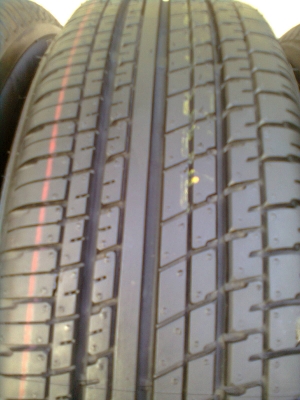 ขายยางป้ายแดงพร้อมกะทะเหล็ก 4 รู 175/65R15 บริสโตร์ ยางปี13 ตุ่มเส้นสียังอยู่ครบ พร้อมฝาและน๊อต 16ตัว 1ชุด