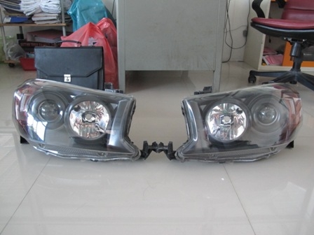 ขายไฟหน้าฟอจูนเนอร์ 2010 รุ่น 2 โคมดำมุมส้ม