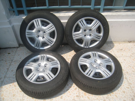 ขายกะทะล้อ Honda jazz ขอบ15 4/100 +ฝาครอบ + ยางปลายปี12 ( 081-3747940)
