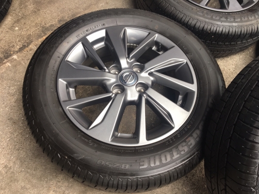 แม็กป้ายแดง Nissan Almera Sportech พร้อมยางป้ายแดง 185-65-15  Bridgestone