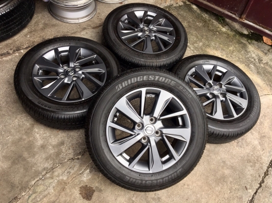 แม็กป้ายแดง Nissan Almera Sportech พร้อมยางป้ายแดง 185-65-15  Bridgestone