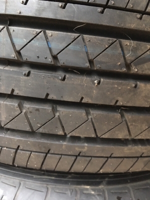 ล้อกะทะป้ายแดง revo 15 ยาง 205 70 15 ตุ่มหน้าสีเส้นยังอยู่