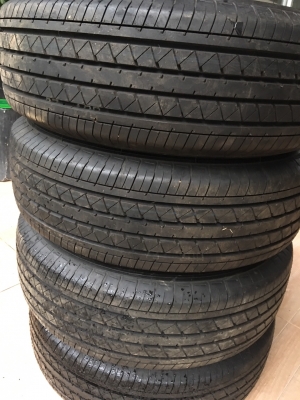 ล้อกะทะป้ายแดง revo 15 ยาง 205 70 15 ตุ่มหน้าสีเส้นยังอยู่