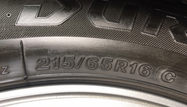 ล้อแม็ก Toyota Vigo Champ สีเทาดำ พร้อมยาง Bridgestone 215-65-16