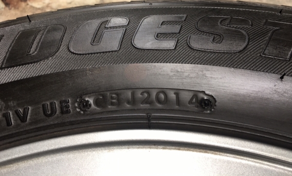 ล้อแม็ก Toyota Vigo Champ สีเทาดำ พร้อมยาง Bridgestone 215-65-16