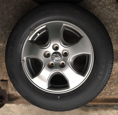 ล้อแม็ก Toyota Vigo Champ สีเทาดำ พร้อมยาง 215-65-16 ปี 12