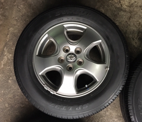 ล้อแม็ก Toyota Vigo Champ สีเทาดำ พร้อมยาง 215-65-16 ปี 12