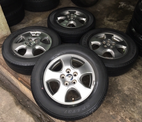 ล้อแม็ก Toyota Vigo Champ สีเทาดำ พร้อมยาง 215-65-16 ปี 12