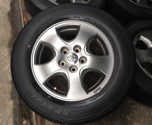 ล้อแม็ก Toyota Vigo Champ สีเทาดำ พร้อมยาง 215-65-16 ปี 12