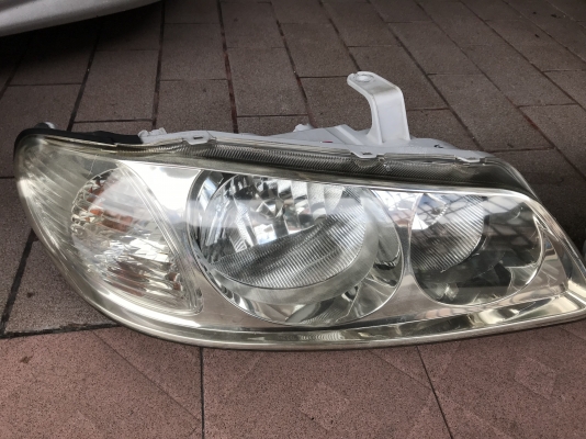 ไฟหน้า NISSAN NEO ตัวท้ายเเตงโมเก่าญี่ปุ่นสภาพดี