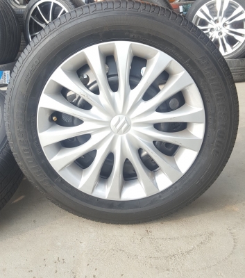 ขายล้อกะทะSUKUKI Swift ขอบ15 พร้อมยาง 4 ล้อ