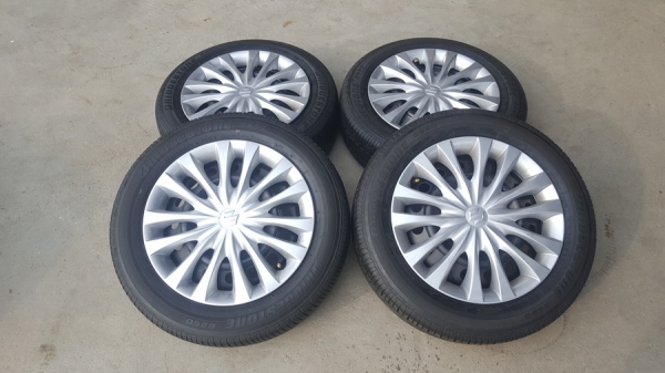 ขายล้อกะทะSUKUKI Swift ขอบ15 พร้อมยาง 4 ล้อ