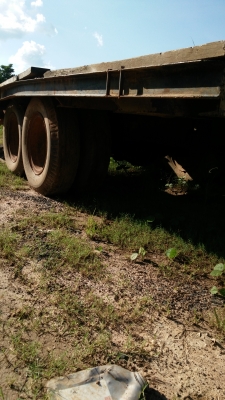 เทเลอร์ขนย้ายแบคโคร 60 หรือรถเกี่ยว