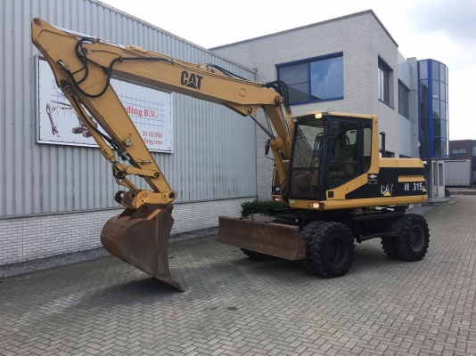 ขายรถขุดล้อยาง CAT M315 ปี 1997 นำเข้าจากเยอรมัน
