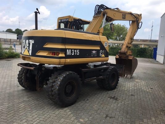 ขายรถขุดล้อยาง CAT M315 ปี 1997 นำเข้าจากเยอรมัน ขายรถขุดล้อยาง CAT M315 ปี 1997 นำเข้าจากเยอรมัน