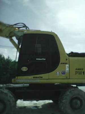 มาแล้ว รถขุดล้อยาง KOMATSU PW130-8