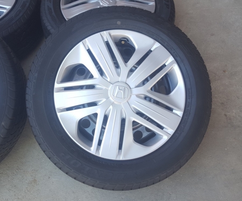 ขายล้อกะทะHONDA ขอบ15 ยางพร้อมฝาครอบ 4 ล้อ