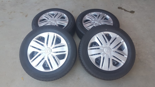 ขายล้อกะทะHONDA ขอบ15 ยางพร้อมฝาครอบ 4 ล้อ