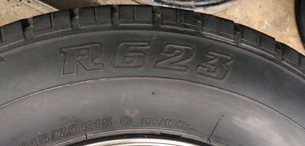 ล้อแม็ก ISUZU D-MAX Platinum สีเทาดำ ขอบ 15 พร้อมยาง 215-70-15 Bridgestone ปี 11