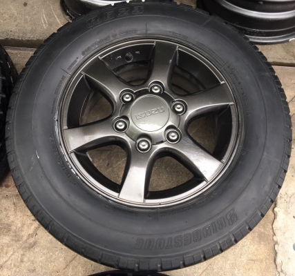 ล้อแม็ก ISUZU D-MAX Platinum สีเทาดำ ขอบ 15 พร้อมยาง 215-70-15 Bridgestone ปี 11