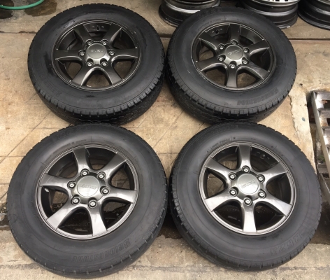 ล้อแม็ก ISUZU D-MAX Platinum สีเทาดำ ขอบ 15 พร้อมยาง 215-70-15 Bridgestone ปี 11