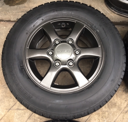 ล้อแม็ก ISUZU D-MAX Platinum สีเทาดำ ขอบ 15 พร้อมยาง 215-70-15 Bridgestone ปี 11