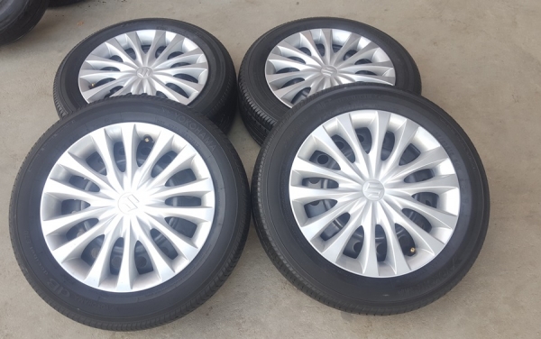 ขายล้อกะทะSUKUKI Swift ขอบ15 พร้อมยาง 4 ล้อ