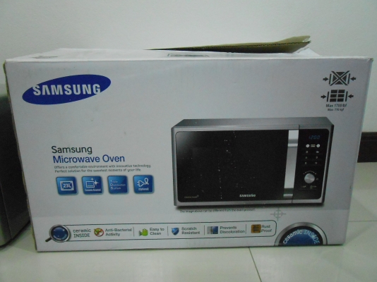 ไมโครเวฟ Samsung รุ่น MG23F301EAS ความจุ 23 ลิตร มีระบบย่าง สภาพใหม่ มีกล่อง