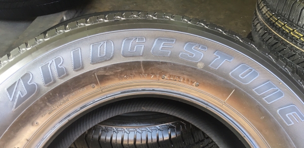 ยางป้ายแดง Bridgestone 265-65-17 ปลายปี 17 ยางป้ายแดง Bridgestone 265-65-17 ปลายปี 17