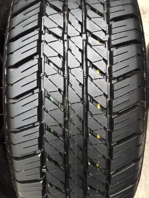 ยางป้ายแดง Bridgestone 245-70-16 ปี 17 เส้นสีแจ่มๆ