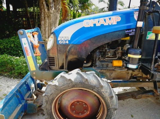 แชมป์YTO604 4 WD ขนาด 60 แรง 4 สูบ ทำงาน 1013 ชั่วโมง ใบมีดดันหน้า โรตารี่