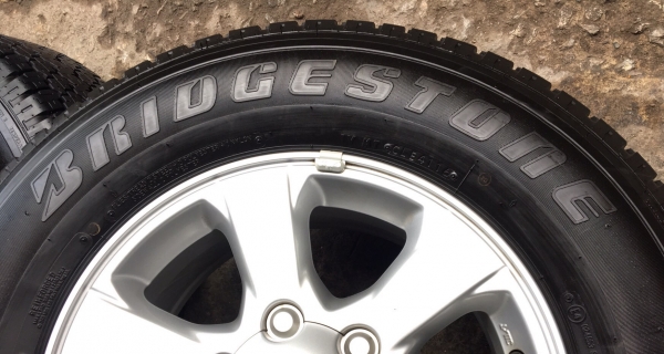 แม็กป้ายแดง ISUZU New D-Max 1.9 Blue Power ขอบ 16 พร้อมยาง Bridgestone 245-70-16 ปลายปี 16 ตุ่มยังอยู่