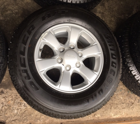 แม็กป้ายแดง ISUZU D-MAX Blue Power ขอบ 16 พร้อมยางป้ายแดง Bridgestone 245-70-16 ปี 17