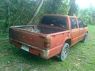 ขายรถกระบะ 4 ประตู MAZDA แม็กนั่ม ใส่เครื่อง นิสสัน LD28 6 สูบ เชื้อเพลิงดีเซล พวงมาลัยเพาเวอร์ เกียร์ธรรมดา ราคา 35000